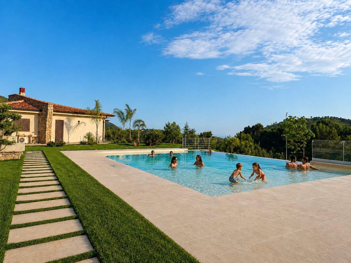 Piscina Villa Heaven al tramonto con luci subacquee